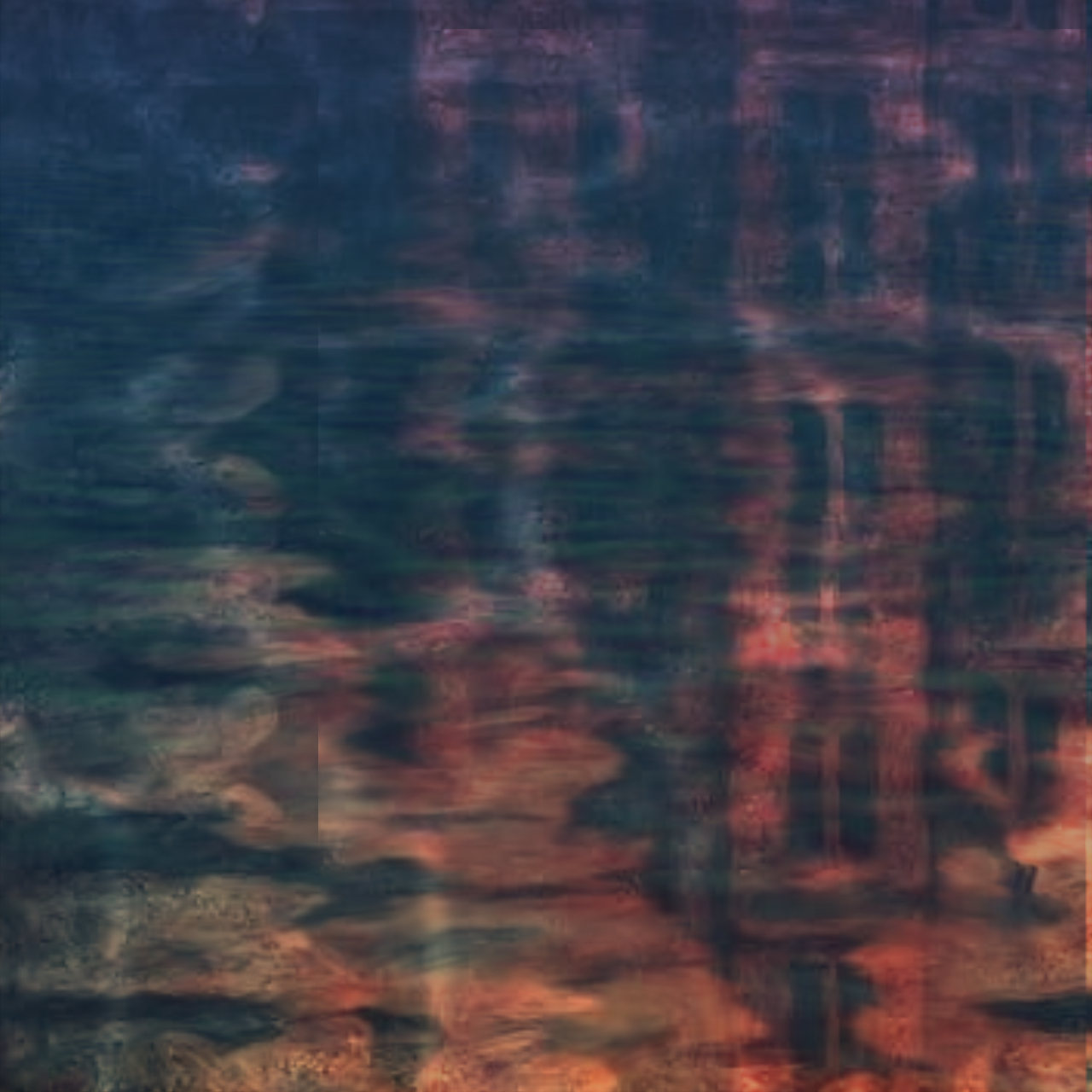 A distorted reflection of the manor in water